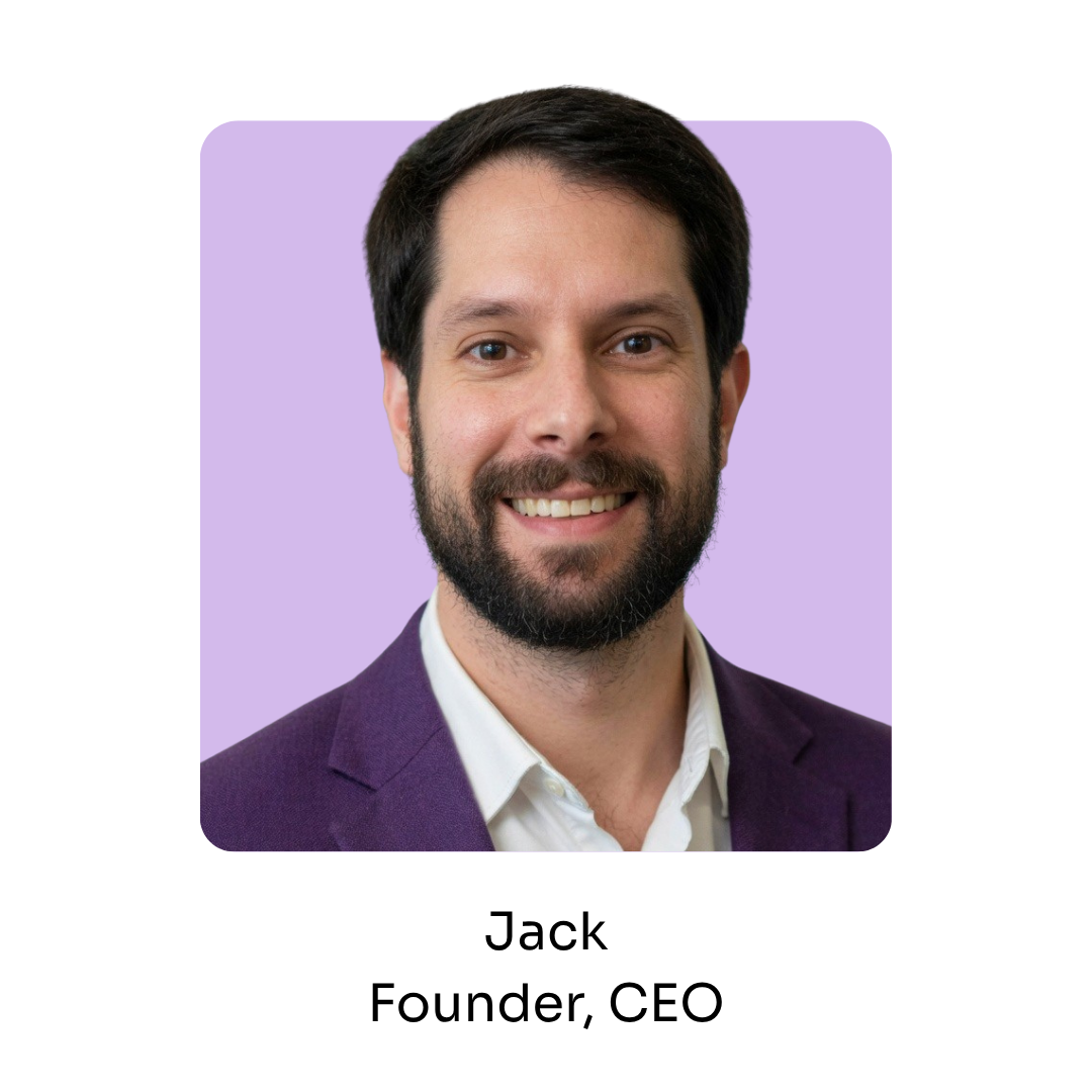 Headshot of Jack, founder and CEO, a smiling man in a lavender suit jacket and white shirt.